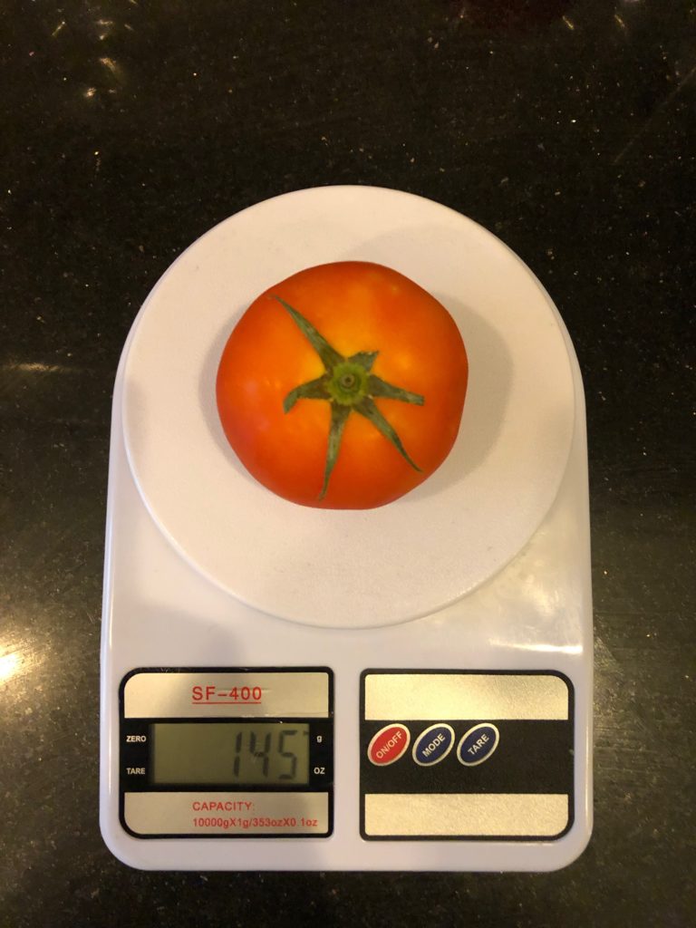 weight of an average tomato (tomato)