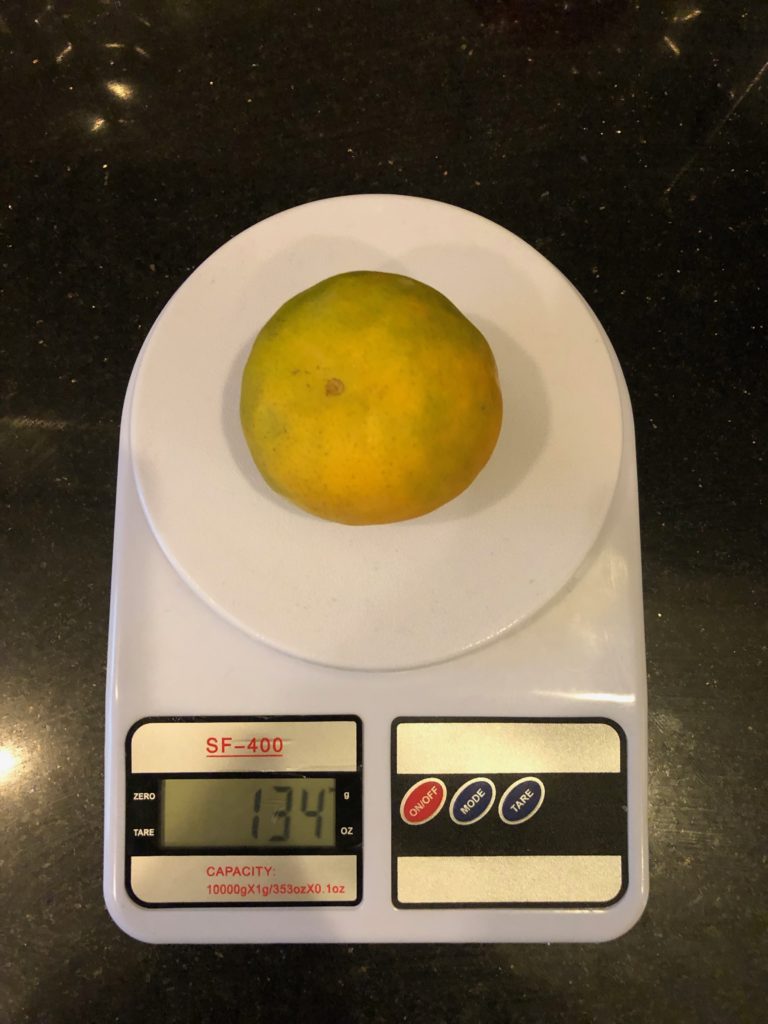 Сколько весит крупный мандарин?