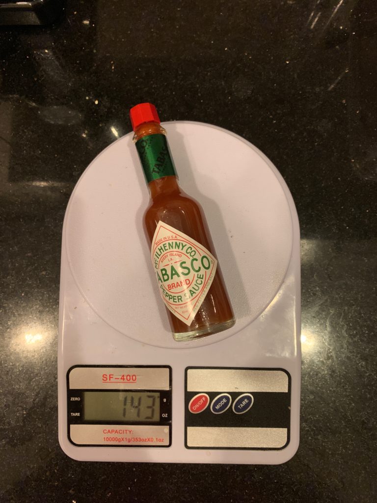 weight of a bottle of Tabasco sauce