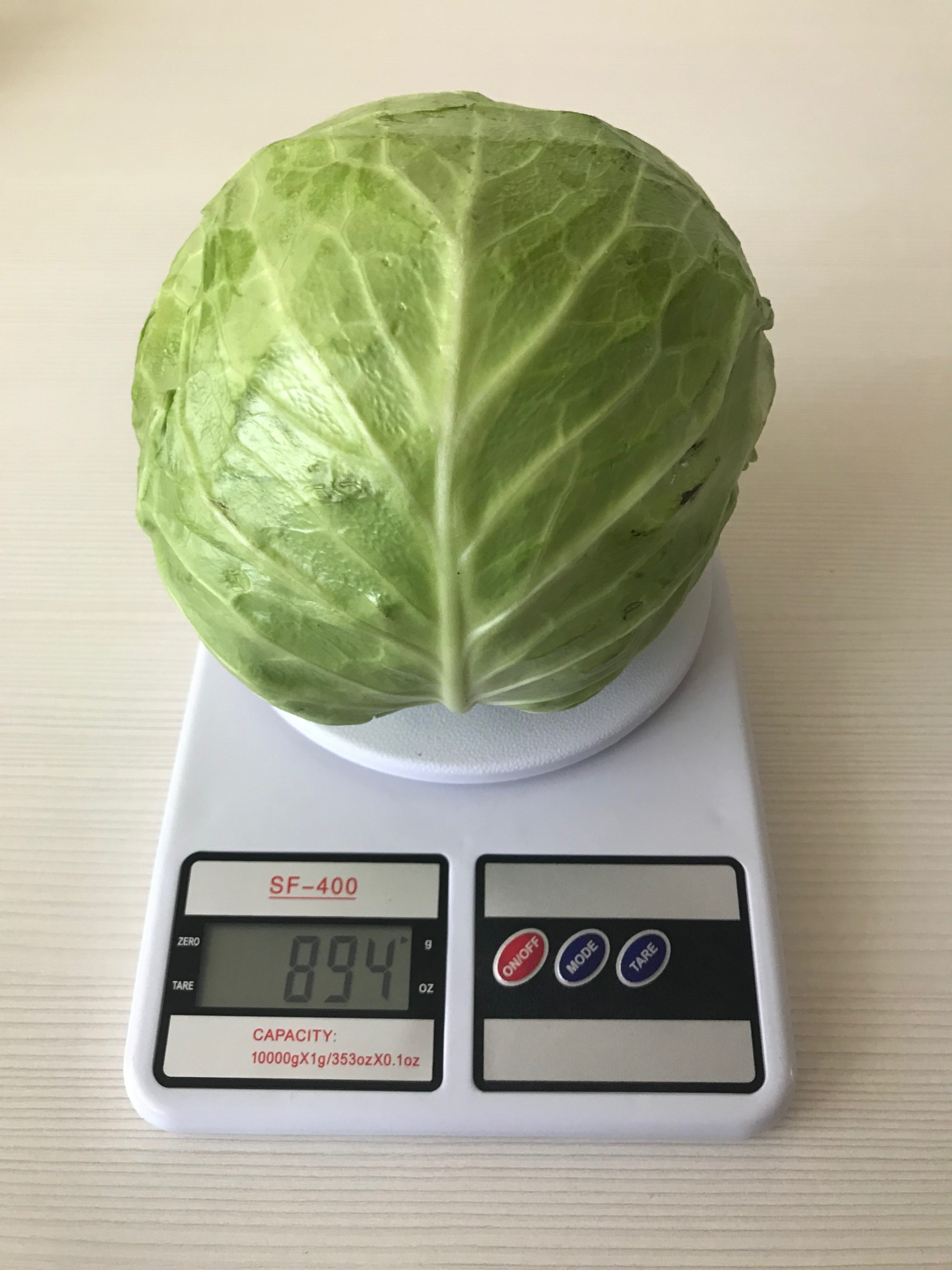 How much does a head of cabbage (medium) weigh?