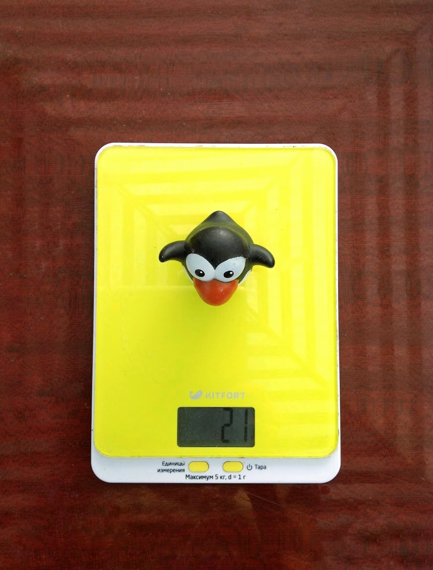 вага іграшкового пінгвіна