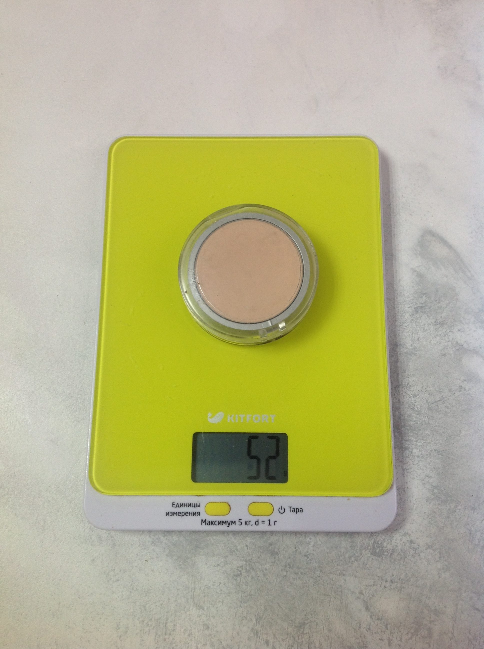 the weight of the compact powder