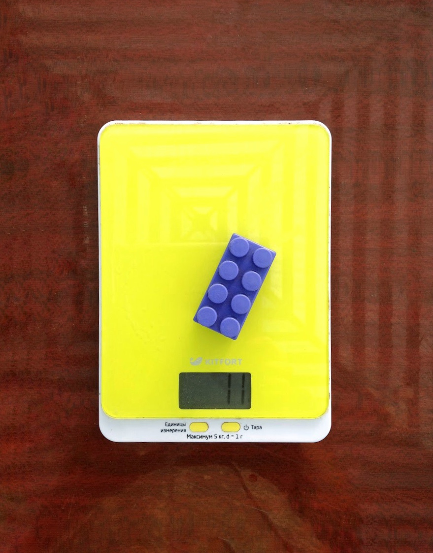 Gewicht eines durchschnittlichen Legosteins