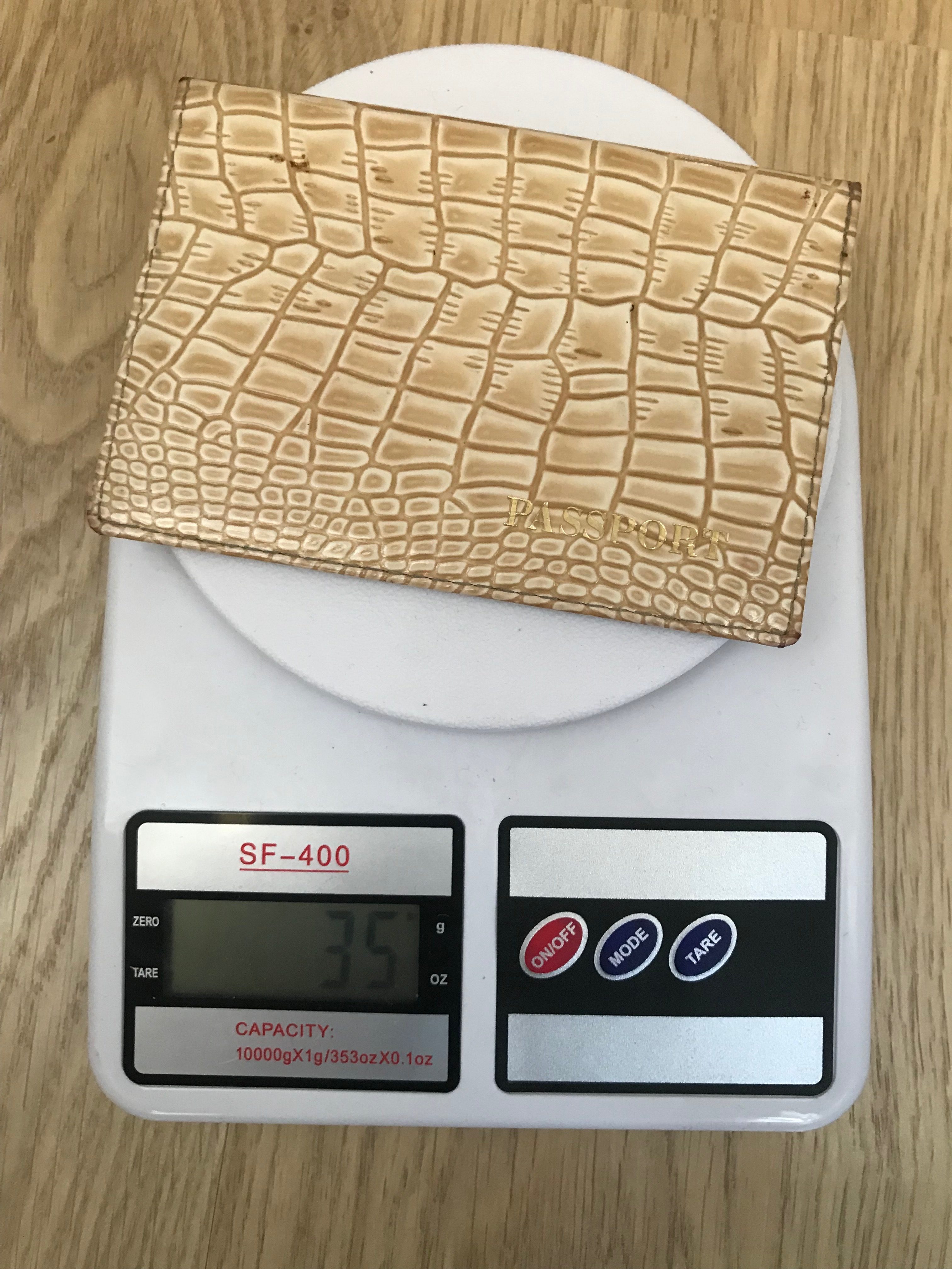 How much does a passport cover weigh?