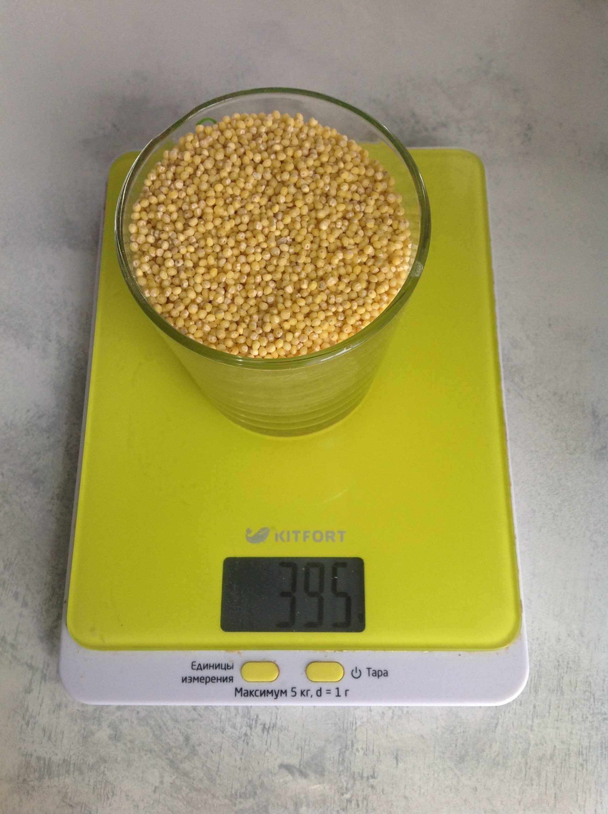 How much does dry millet weigh in a glass of 250 ml?