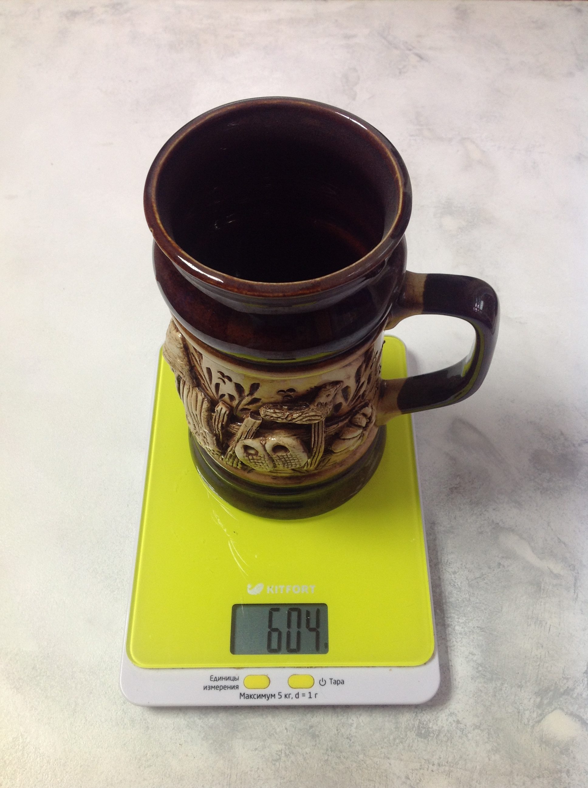 How much does a large ceramic beer mug weigh?