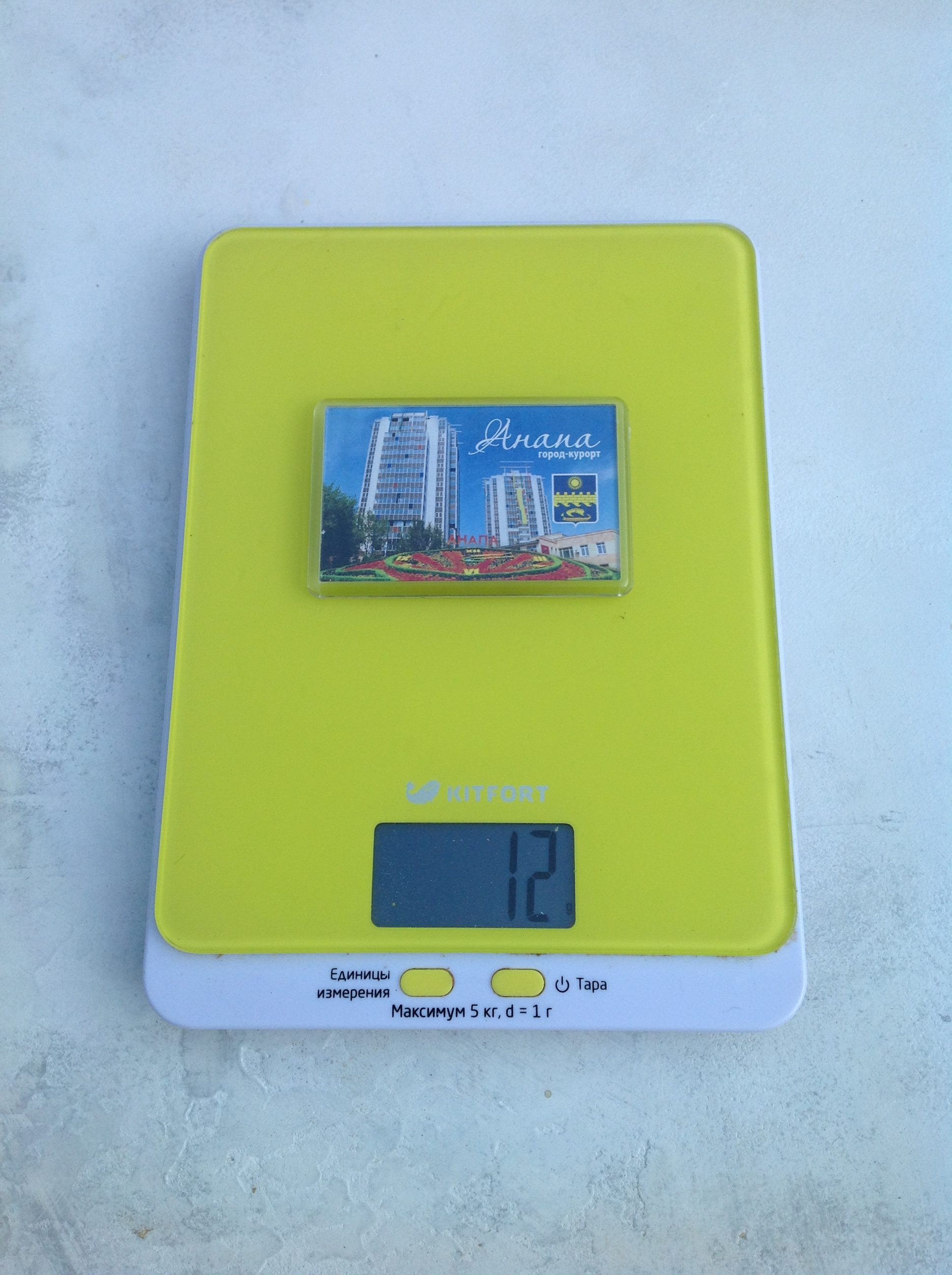 How much does a medium acrylic magnet weigh?