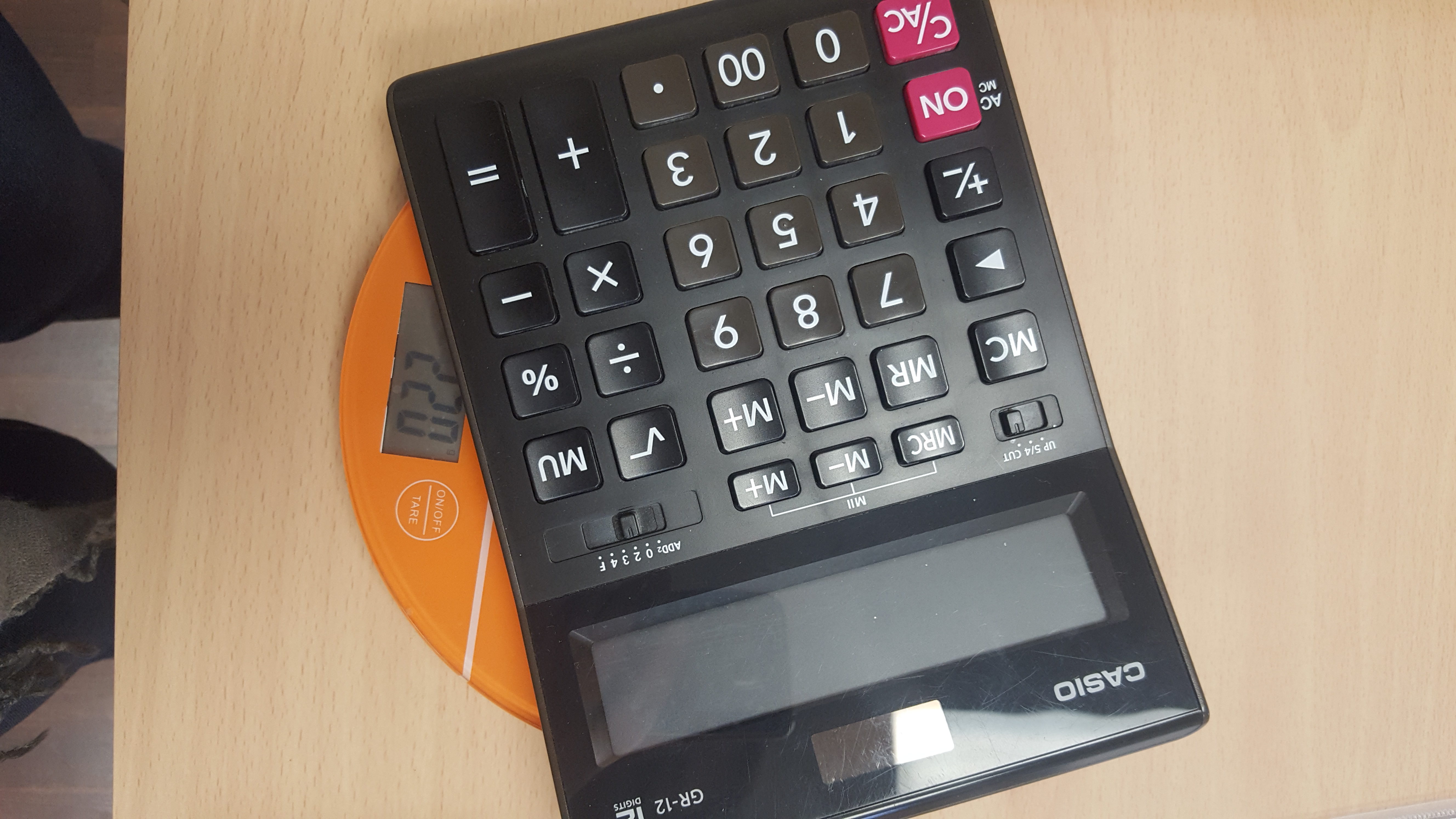 the weight of a large calculator